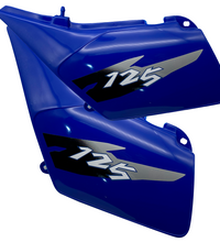 JUEGO TAPA LATERAL TS CN 125 INYECTADA